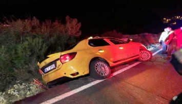 İzmir’de yürekleri ağza getiren olay: Ticari taksi bankette asılı kaldı, 3 kişilik aile itfaiye tarafından kurtarıldı