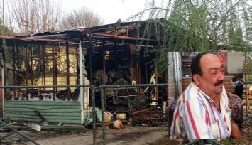 Evinin yanmasına kalbi dayanmadı  