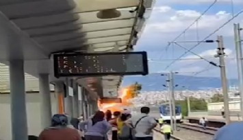 İZBAN İstasyonu'nda korkutan olay: Ağaç elektrik tellerine devrildi, ağaç yandı