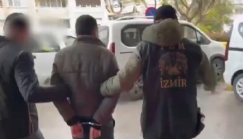 İzmir'de PKK operasyonunda şüphelinin açmadığı kapı koçbaşıyla kırıldı