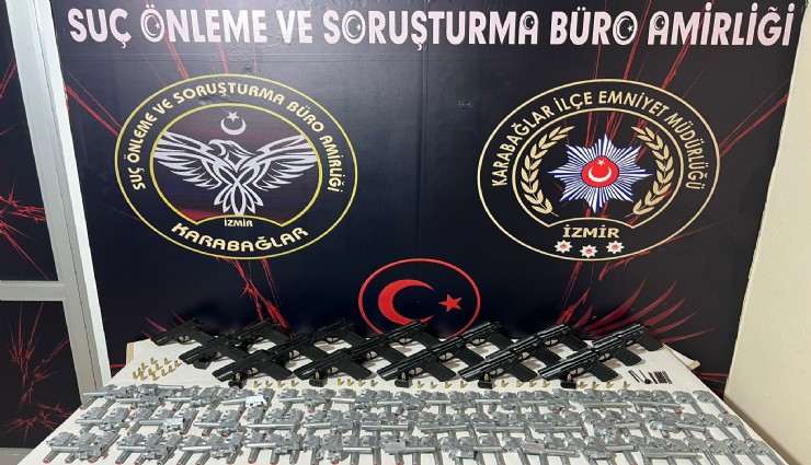 İzmir'de silah ticareti operasyonu: Gizli bölmelerde ele geçirildi