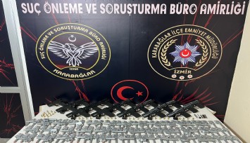 İzmir'de silah ticareti operasyonu: Gizli bölmelerde ele geçirildi