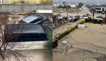 Yarım saatlik yağış Kuşadası’nı felç etti: Araçlar sele kapıldı