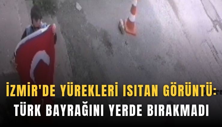 İzmir'de yürekleri ısıtan görüntü: Türk bayrağını yerde bırakmadı