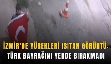 İzmir'de yürekleri ısıtan görüntü: Türk bayrağını yerde bırakmadı