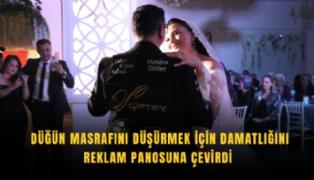 Düğün masrafını düşürmek için damatlığını reklam panosuna çevirdi