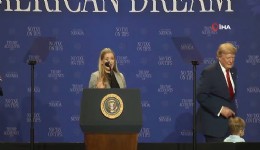 Trump sahnede küçük çocuğun düşmesini engelledi