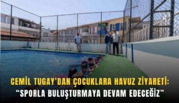 Tugay, yüzme eğitimi alan çocuklarla buluştu
