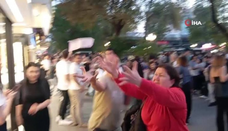 Kızılay’da klip çekiminde ilginç anlar: Binadan para saçıldı, vatandaşlar birbirine girdi